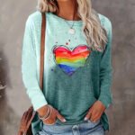 Gradient Color Long Sleeve Loose Fitting Casual Top With A Round Neck And A Heart Print
